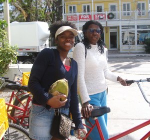 Phoebe & mother on red cruiser bikes, Key West, FL
