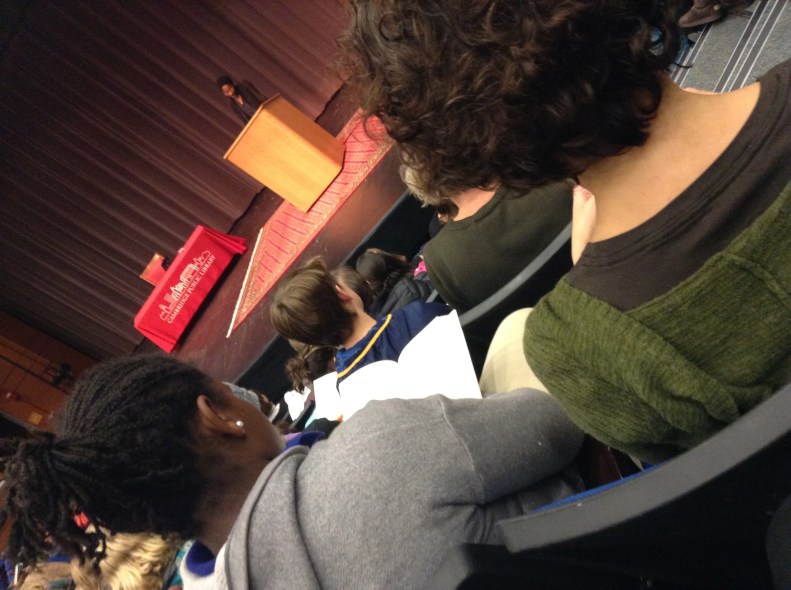 Book fan reads along with speaker