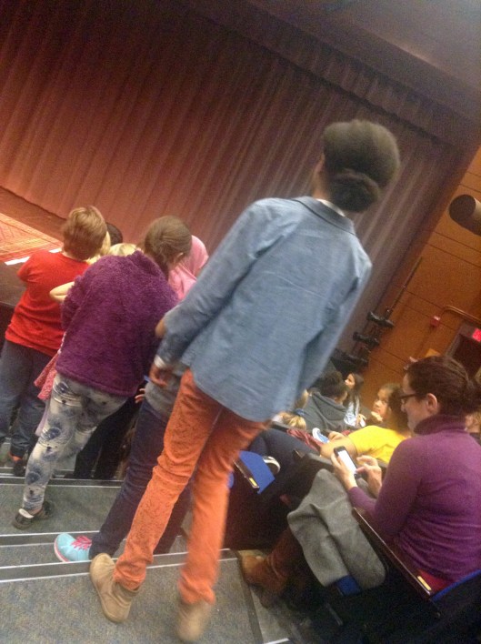 Children wait in line to ask quetions